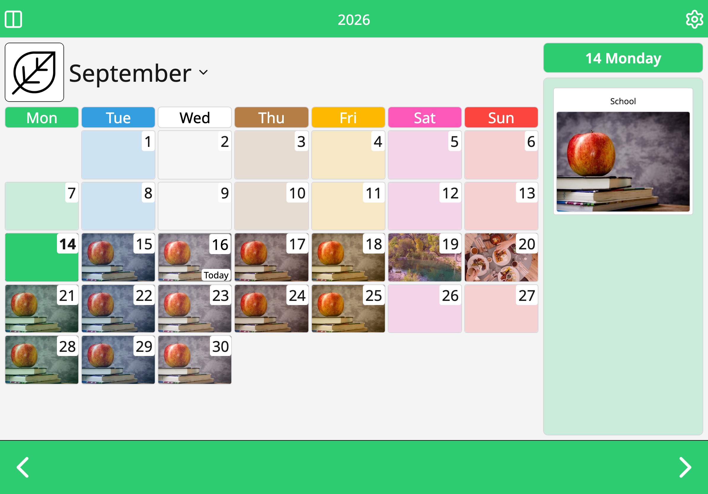 The month view in Moi Calendar on a tablet, with the tapped day's activities beside the grid